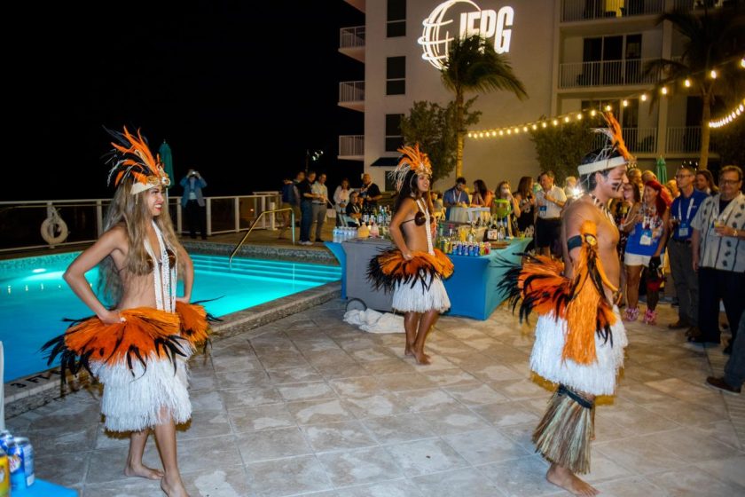 The 2021 IFPG Retreat kicked off with a rooftop party complete with a fire show and hula dancers