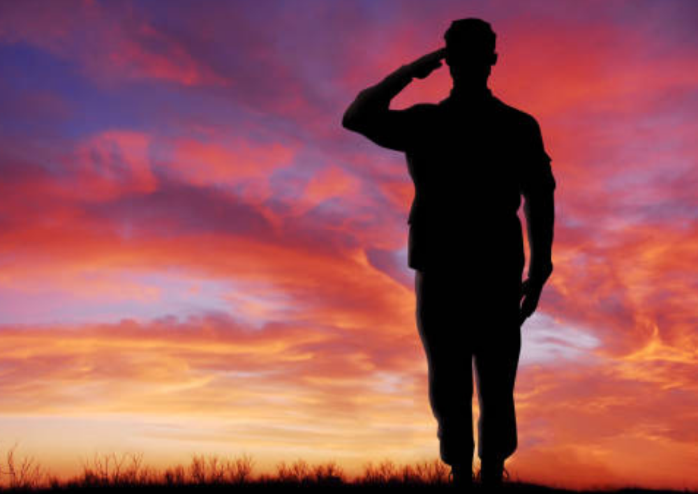 Veteran-focused franchise opportunities: Saluting soldier silhouette