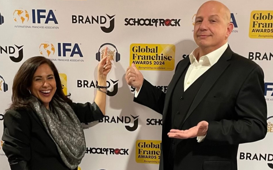 BizCom COO Monica Feid poses with Brand J CEO Jack Monson.