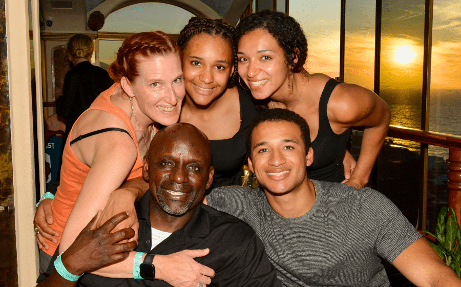 Real Property Management franchise owner Eric Peoples with his wife and three children