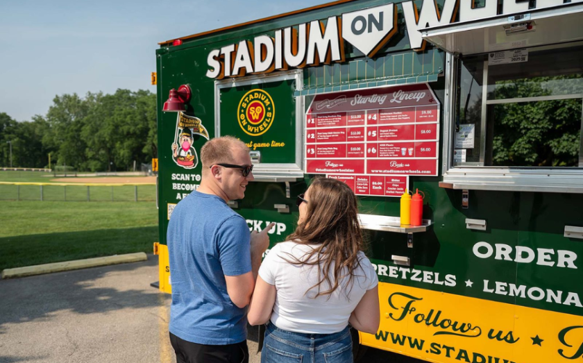 Customers at a Stadium on Wheels franchise business