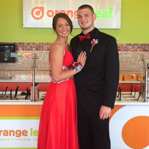 Trevor and Stephanie Bernhardt, Orange Leaf franchise owners at prom