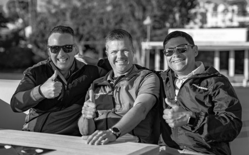 Jesse Johnstone with franchisees Chad Kamerud and Alex Fachinello