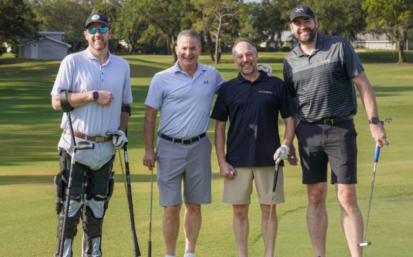 John Conway and franchisees participating in the Paul Davis golf tournament
