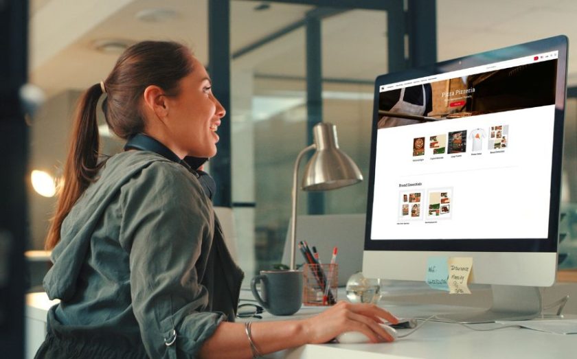 Woman using Alpha Graphics products