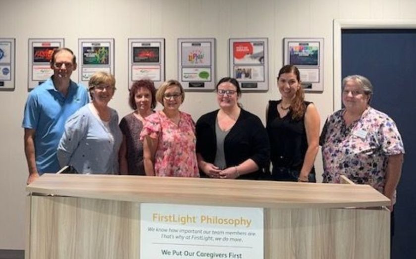 The Flemings with their team - FirstLight Home Care franchise