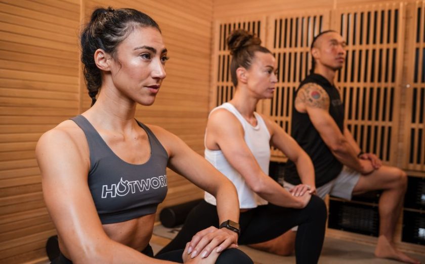 HOTWORX franchise clients stretching