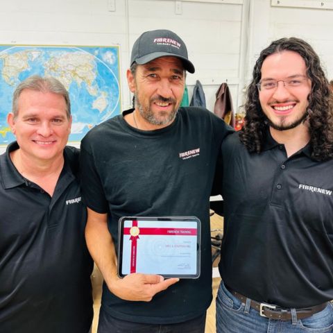 Mike and Jonathan Hill, Fibrenew franchise owners, and staff member