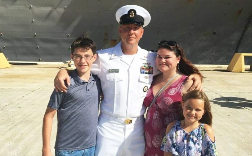 The Grounds Guys franchise owner James O’Brien above with family